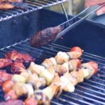 Do you close grill while charcoal is burning